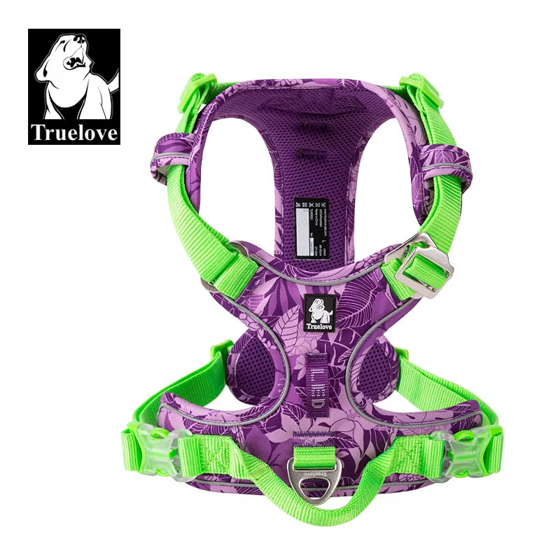 Purple and green dog harness with floral pattern on a white background, featuring the Truelove brand.