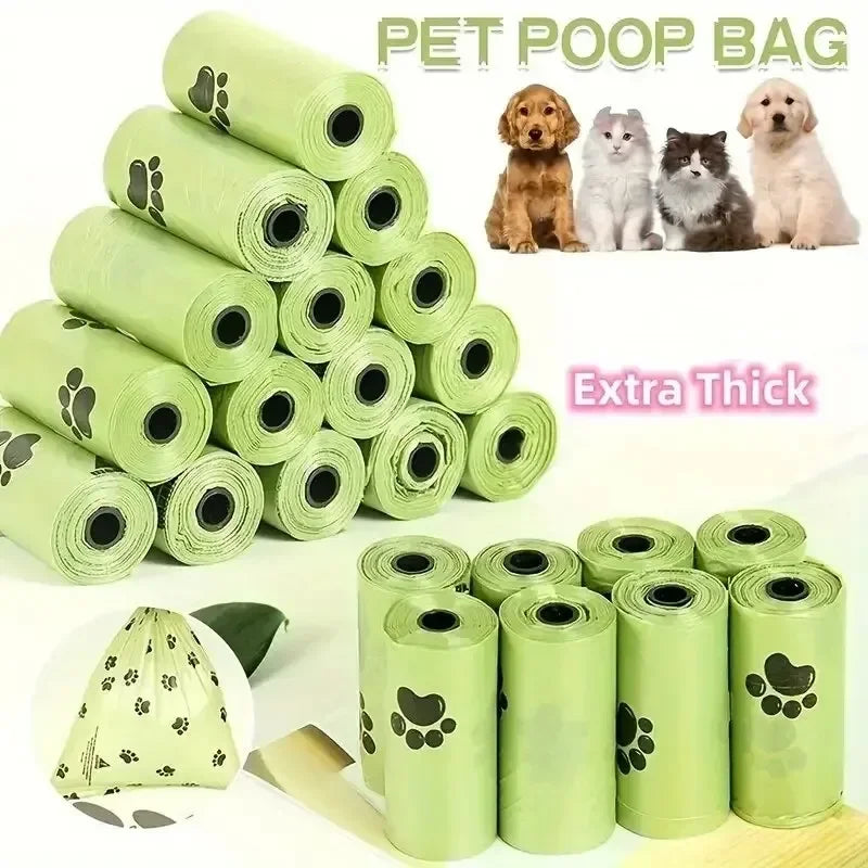Roll of thick, leak‑proof dog poop bags with easy-tear perforations in green pattern