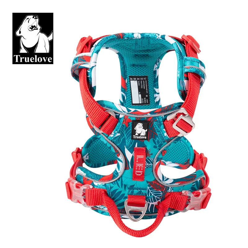 Colorful dog harness with red and blue design on a white background, featuring the Truelove brand logo.